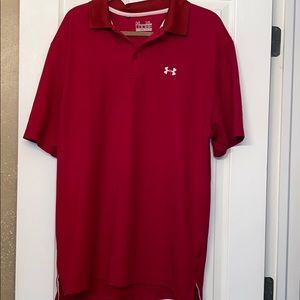 Under ARMOUR heat gear loose fit polo.  XL